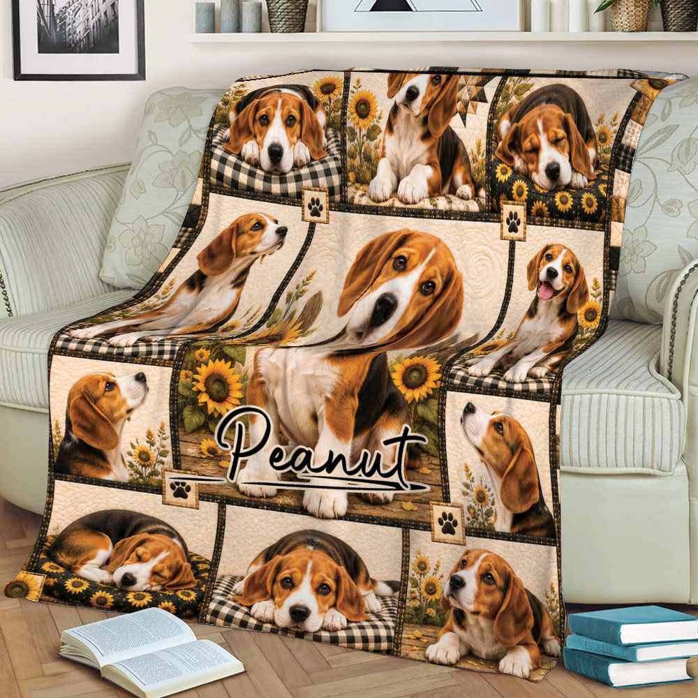 Close view of a Beagle blanket covering a sofa, featuring multiple dogs, sunflowers, and paw prints