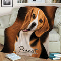 Beagle throw blanket styled on a sofa with a detailed tri-color Beagle face and warm brown artwork