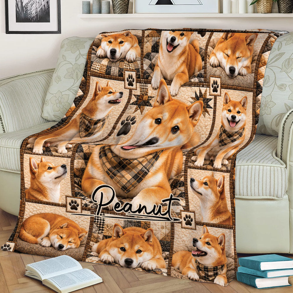 Close view of a Shiba Inu blanket on a couch featuring multiple playful and sleeping dogs