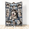 Alaskan Malamute blanket featuring multiple dogs, snowy mountains, paw prints, and blue winter artwork