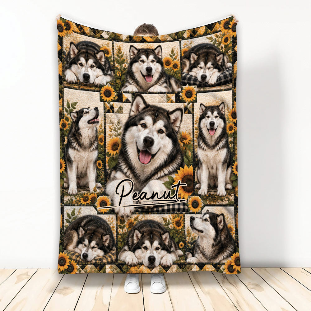 Alaskan Malamute blanket displayed upright with multi-panel dog artwork and sunflower accents