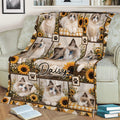Ragdoll cat throw blanket spread across a sofa, featuring multiple blue-eyed cats, sunflowers, and paw print details