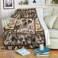Great Dane blanket draped over a sofa, featuring spotted dogs, white daisies, plaid details, and rustic decor