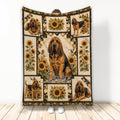 Bloodhound throw blanket with multiple dog illustrations, sunflower panels, and warm rustic artwork