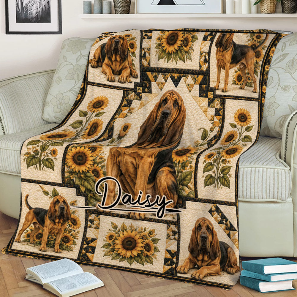Close lifestyle view of a Bloodhound blanket featuring sunflower artwork and several dog scenes
