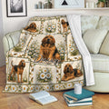 Bloodhound throw blanket displayed on a sofa with daisy artwork and cozy living room decor