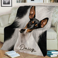 Rat Terrier blanket draped over a sofa, featuring a close-up black, white, and tan dog design