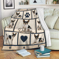 Rat Terrier throw blanket displayed on a sofa with repeated dog portraits and navy decorative details