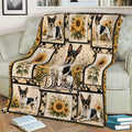 Rat Terrier throw blanket displayed on a couch with sunflower motifs and several illustrated dogs