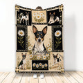 Rat Terrier blanket with black, cream, and gold floral artwork displayed upright