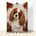 Cavalier King Charles Spaniel blanket displayed upright with detailed chestnut and white dog artwork