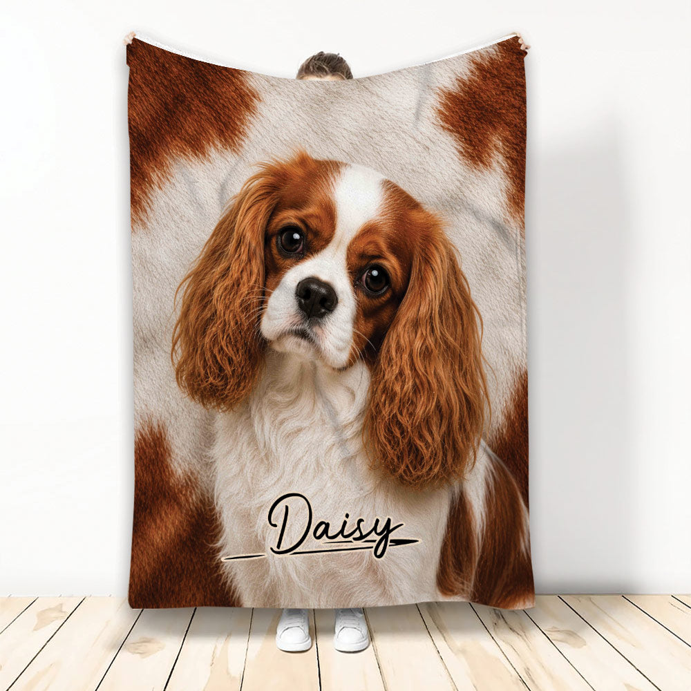 Cavalier King Charles Spaniel blanket displayed upright with detailed chestnut and white dog artwork