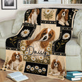 Daisy-themed Cavalier King Charles Spaniel blanket draped over a living room sofa