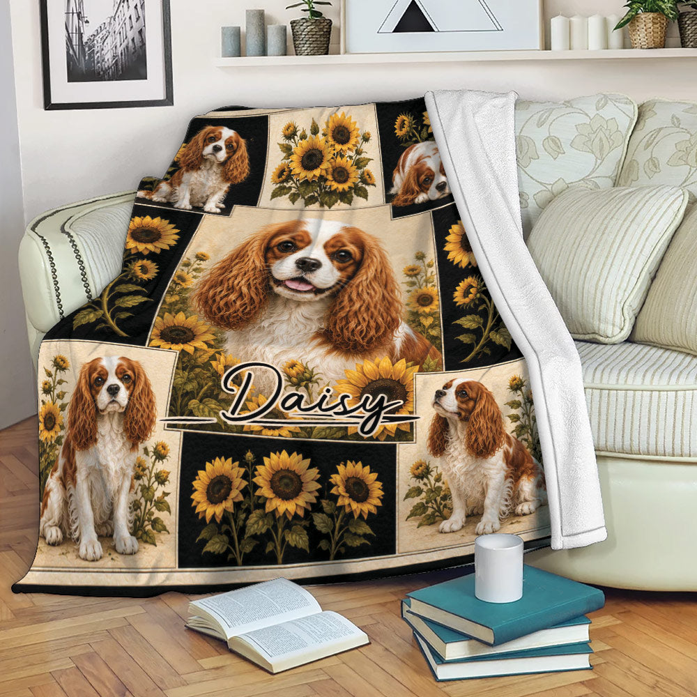 Cavalier King Charles throw blanket draped over a sofa with sunflower collage design