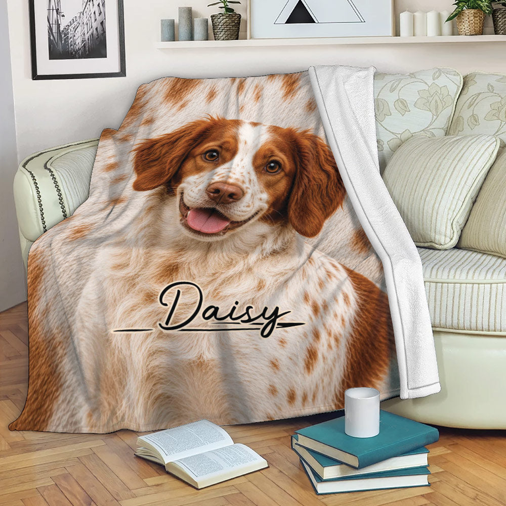 Brittany Spaniel blanket featuring a happy dog design draped across a living room sofa
