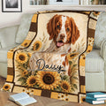 Brittany Spaniel blanket draped over a sofa, featuring sunflowers and warm country colors