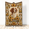 Brittany Spaniel blanket featuring a central dog portrait, sunflower artwork, rustic panels, and decorative star motifs