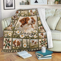 Brittany Spaniel throw blanket draped over a sofa with wildflower dog artwork and cozy living room decor