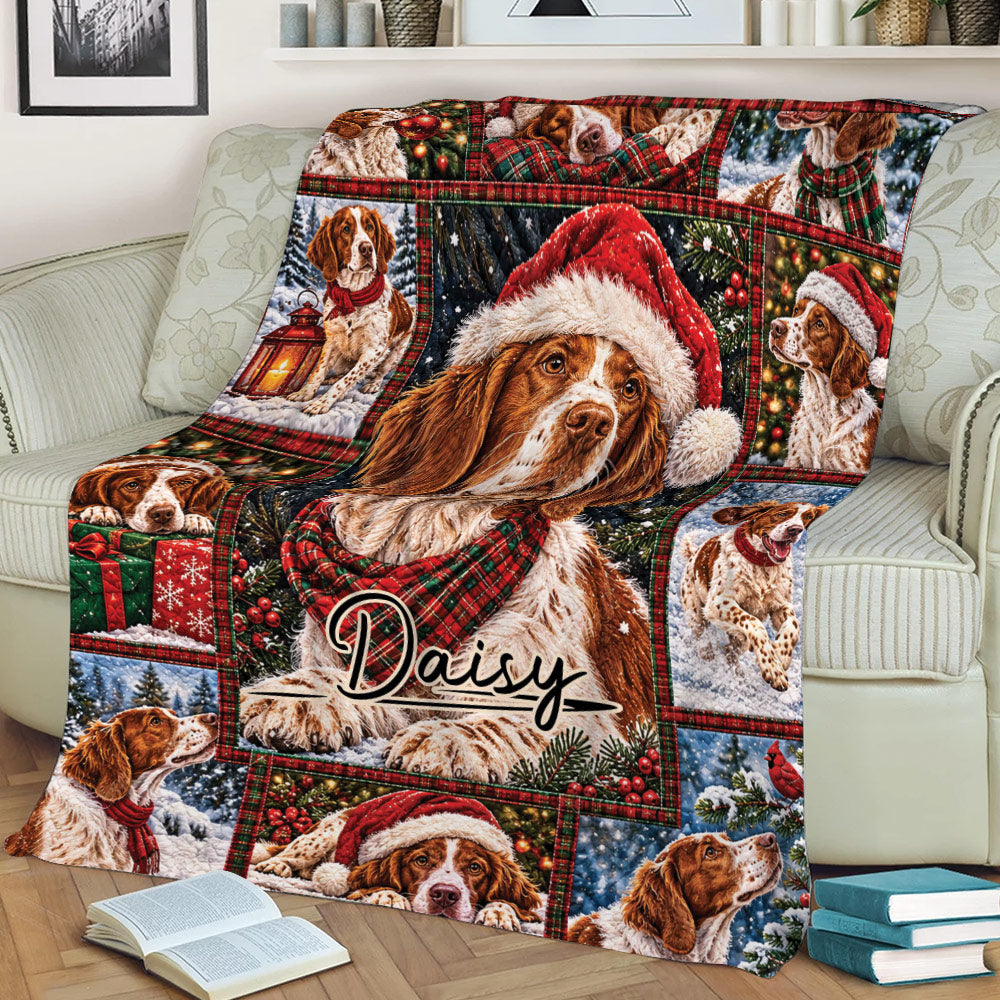 Festive Brittany Spaniel blanket spread across a sofa with Santa hats, scarves, snow, and plaid