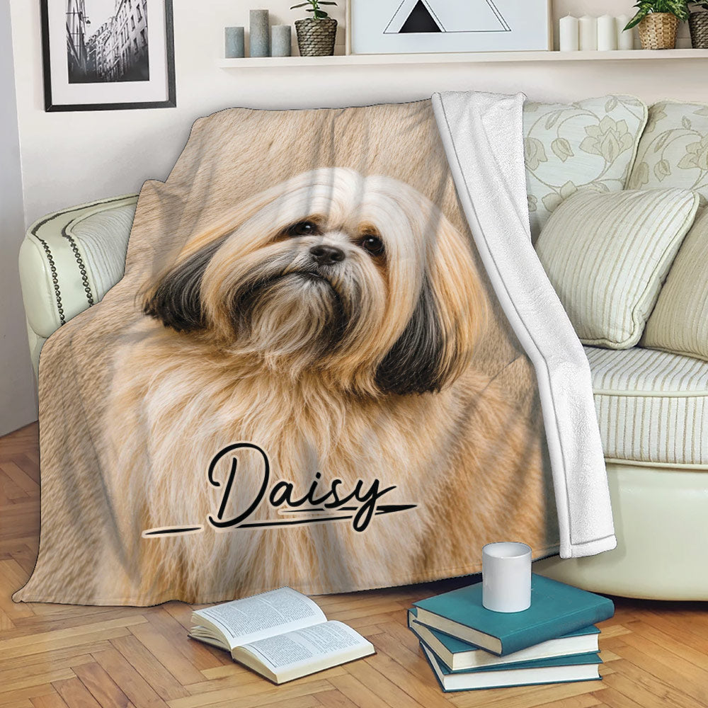 Lhasa Apso throw blanket with long-haired dog artwork styled on a cozy living room sofa
