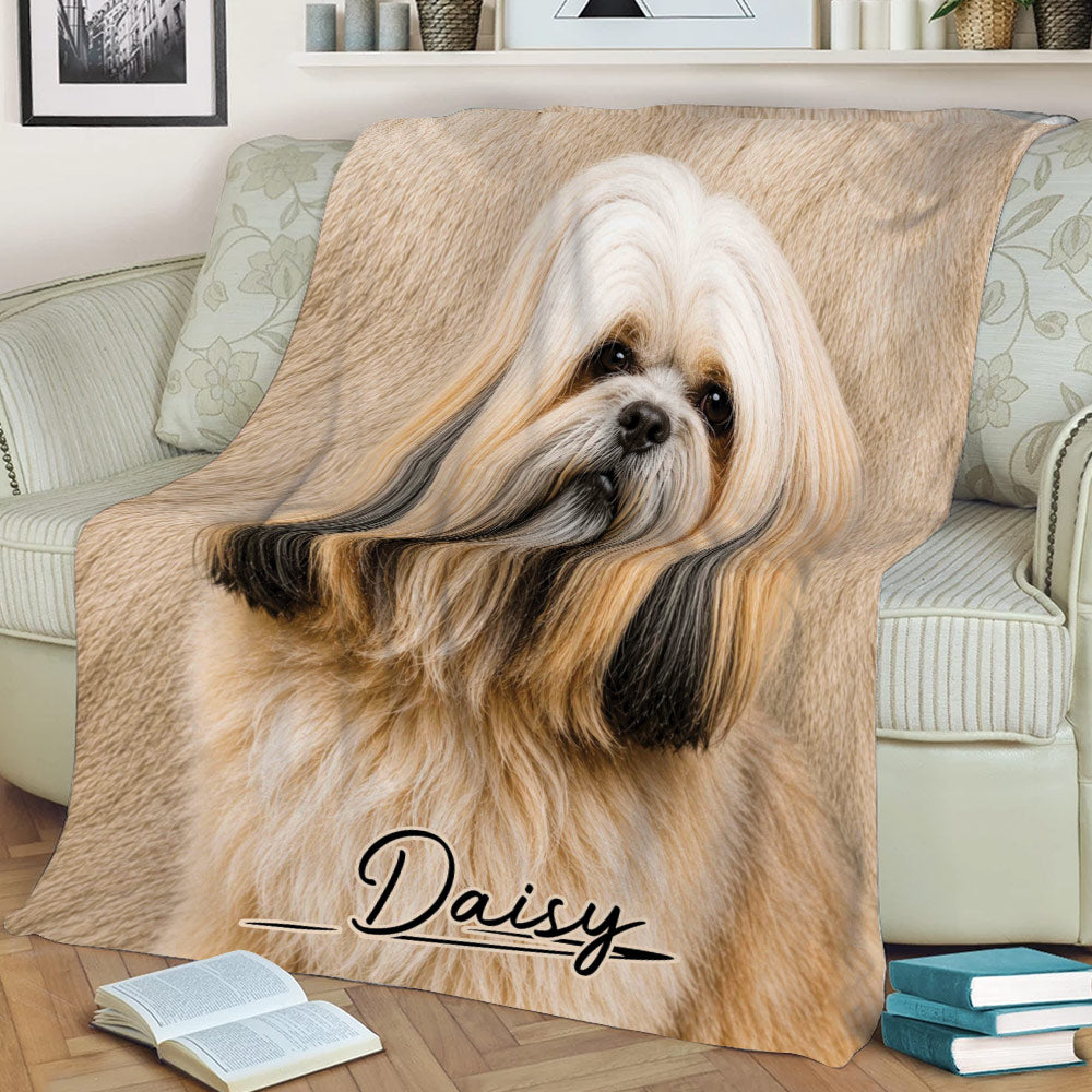 Long-haired Lhasa Apso throw blanket displayed across a sofa with warm neutral artwork