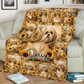 Sunflower Lhasa Apso blanket draped over a sofa, featuring repeated dog portraits in warm golden tones
