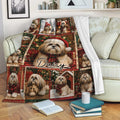 Lhasa Apso Christmas throw blanket displayed on a sofa with festive dog artwork and cozy holiday decor