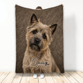 Cairn Terrier throw blanket featuring a detailed shaggy dog portrait on a brown textured background