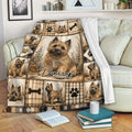 Cairn Terrier throw blanket draped over a sofa with rustic plaid artwork and paw print details