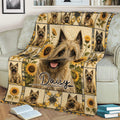 Cairn Terrier throw blanket draped over a sofa, featuring sunflower accents and detailed dog artwork