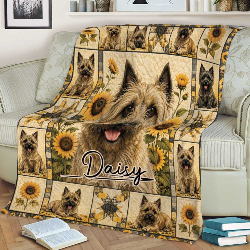 Cairn Terrier throw blanket draped over a sofa, featuring sunflower accents and detailed dog artwork