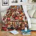 Cairn Terrier Christmas throw blanket draped over a sofa with festive plaid and holiday dog scenes