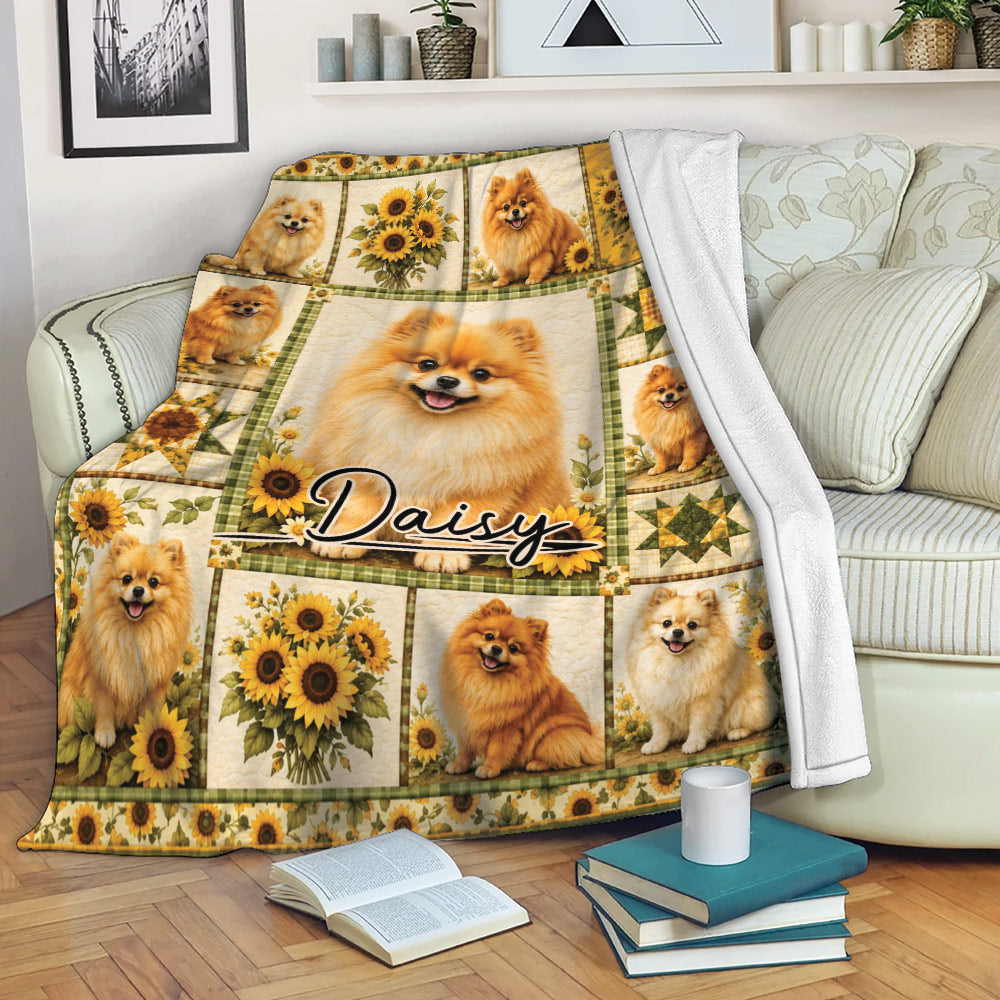 Pomeranian blanket draped over a sofa with sunflower artwork and multiple cheerful dog portraits