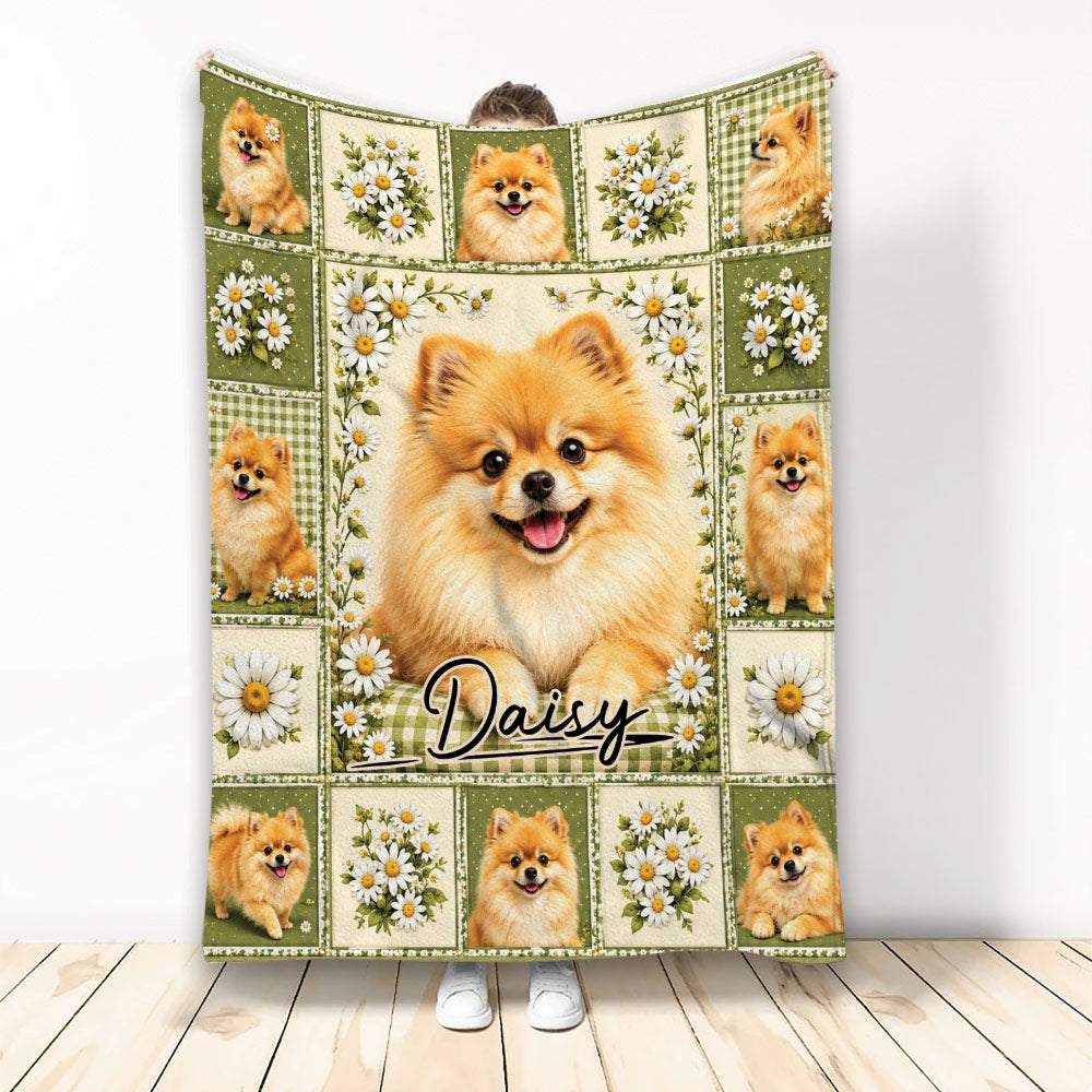 Pomeranian blanket displayed upright with a central fluffy dog portrait, smaller dog panels, and daisy artwork
