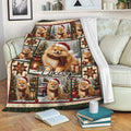 Pomeranian Christmas throw blanket draped over a sofa with holiday dogs, trees, gifts, and lanterns
