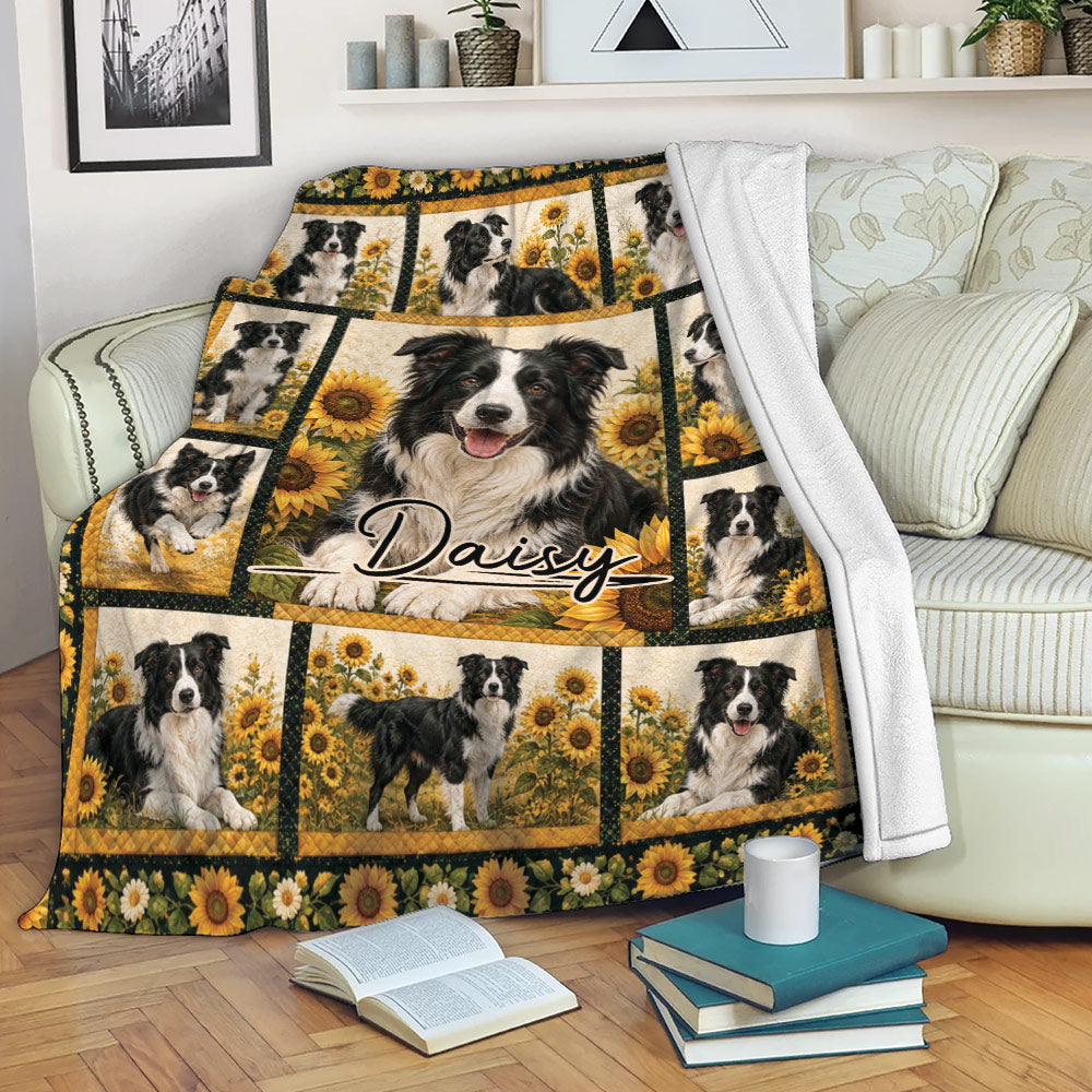 Border Collie throw blanket displayed on a sofa with sunflower artwork and black and white dogs