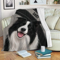 Border Collie throw blanket draped over a sofa in a cozy living room setting