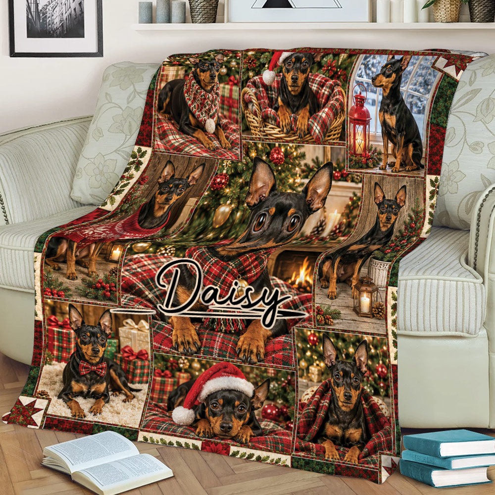 Miniature Pinscher Christmas blanket styled on a couch with plaid portraits, presents, ornaments, and a fireplace