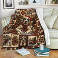 Great Dane Christmas blanket displayed on a sofa with festive plaid, wreaths, and fireplace artwork