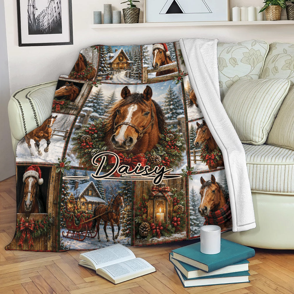 Festive horse throw blanket displayed on a sofa with snowy horse scenes, holiday greenery, and cozy winter artwork