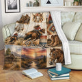 Custom cowgirl blanket draped over a sofa, featuring western horse, ranch and colorful southwestern artwork