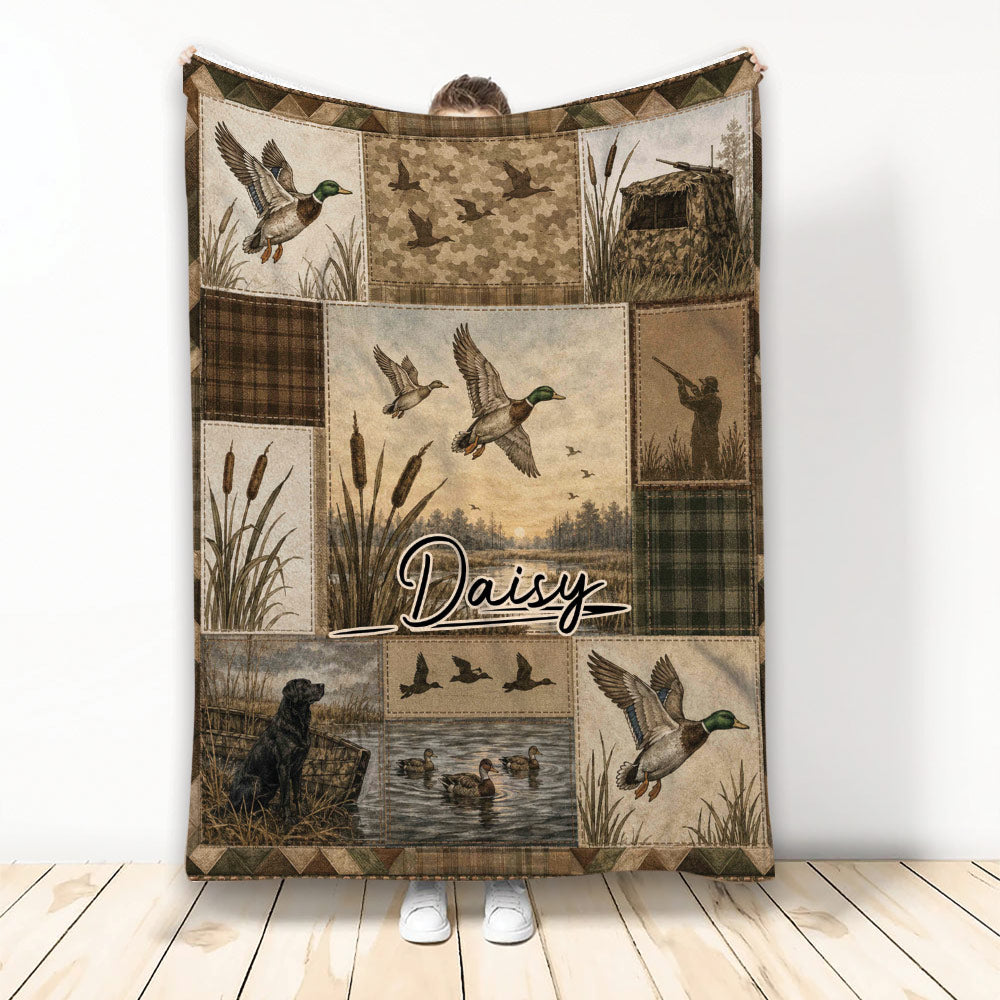 Duck hunting blanket with flying mallards, wetlands, hunting blind, retriever dog, and rustic camouflage patchwork design