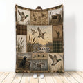 Duck hunting blanket with flying mallards, wetlands, hunting blind, retriever dog, and rustic camouflage patchwork design