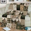 Rustic duck hunting throw blanket on a couch featuring flying waterfowl, mallards, reeds, and woodland scenes