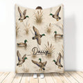 Duck hunting blanket with mallard ducks flying and resting among cattails in a marsh scene