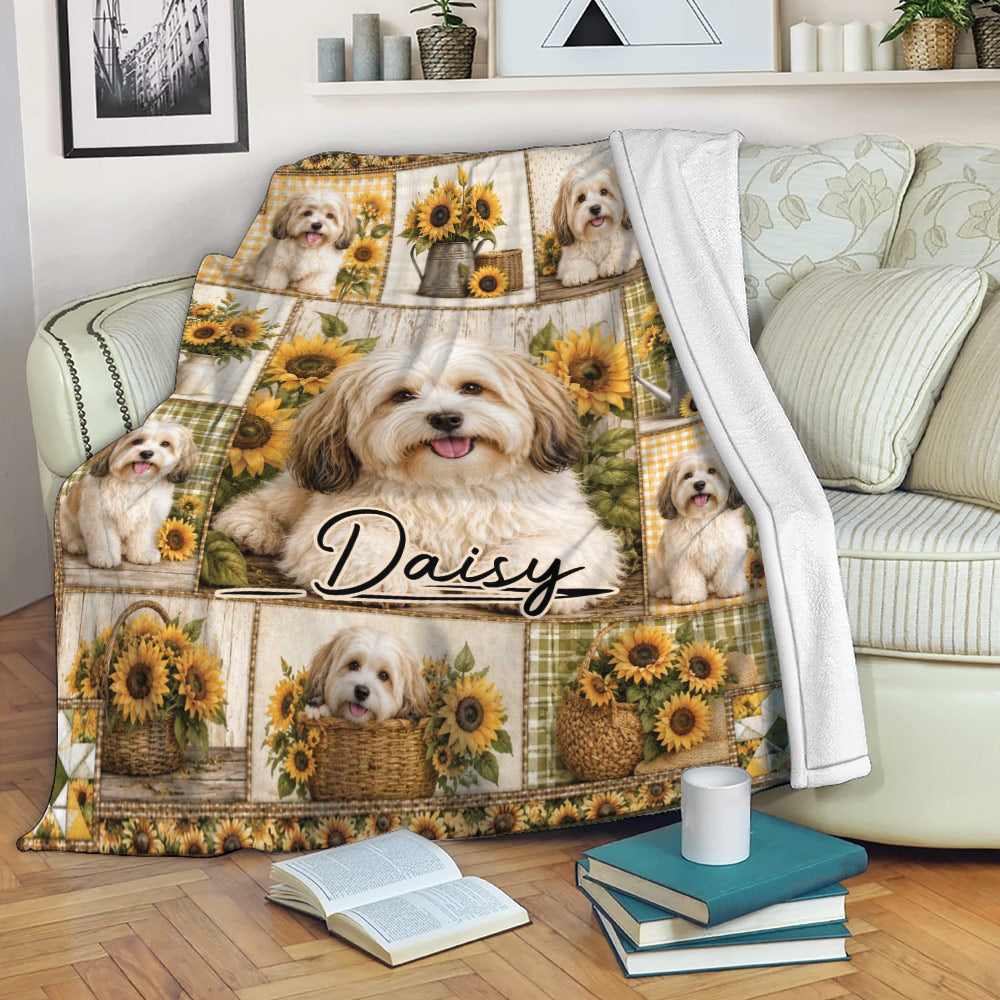 Havanese sunflower blanket draped over a sofa with cozy rustic dog artwork