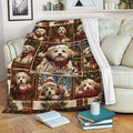 Havanese holiday throw blanket displayed on a sofa with festive dog artwork and cozy Christmas decor