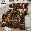Boykin Spaniel Christmas blanket arranged across a sofa with festive dog artwork and plaid accents