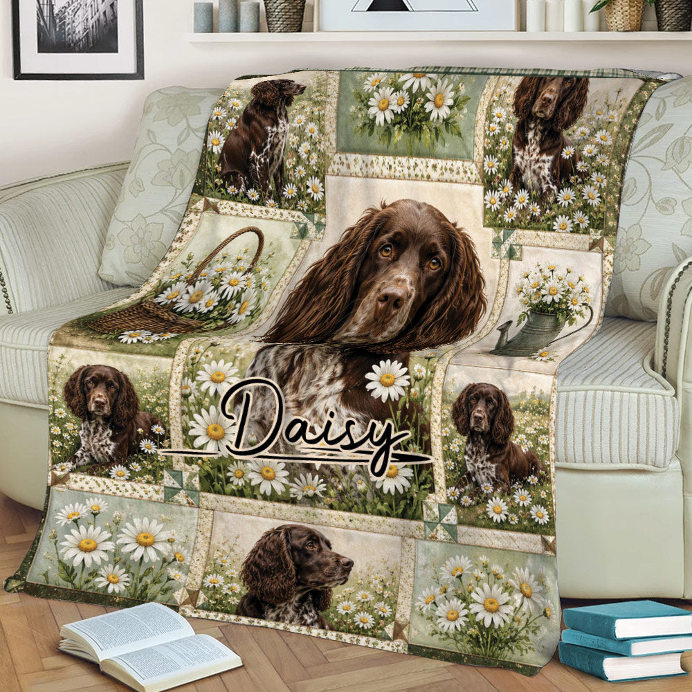 Floral Boykin Spaniel throw blanket styled across a sofa with detailed dog portraits