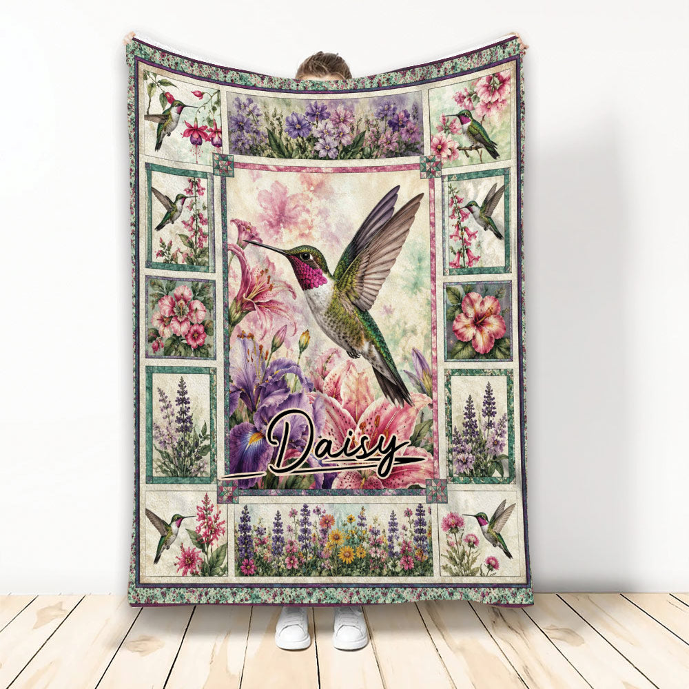 Hummingbird throw blanket with colorful flowers, botanical panels, and a detailed flying bird design